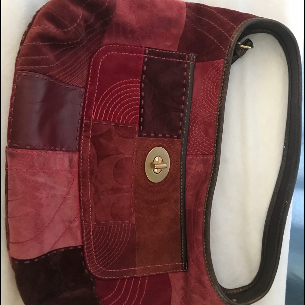 Burgundy patchwork Coach purse.